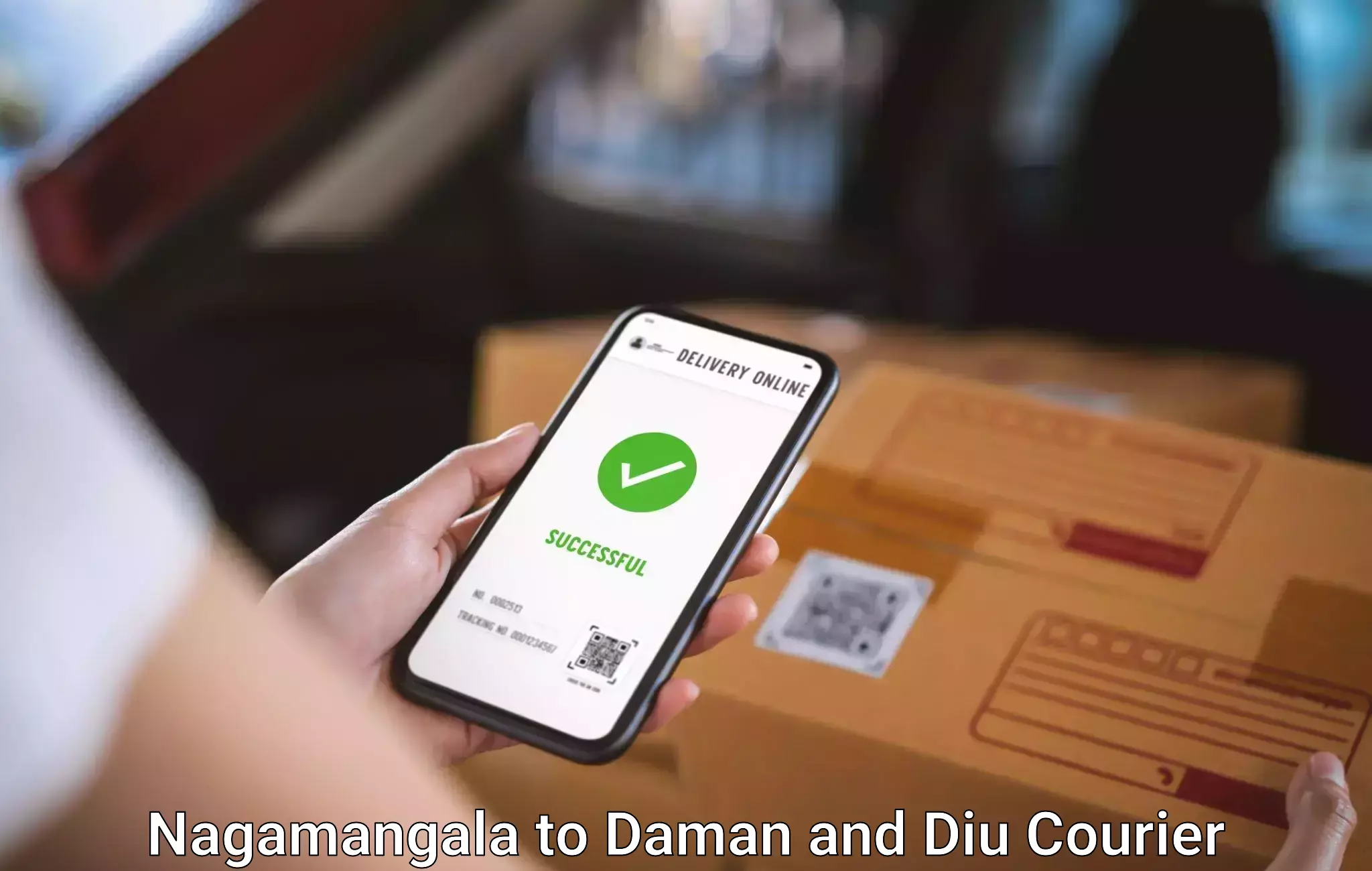 Heavy luggage shipping Nagamangala to Daman